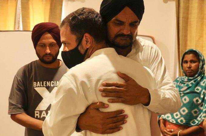 Rahul Gandhi hugs Moosewala's father. Photo Credit : @INCIndia/Twitter
