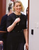 Amber Heard to write about domestic abuse in a tell-all memoir